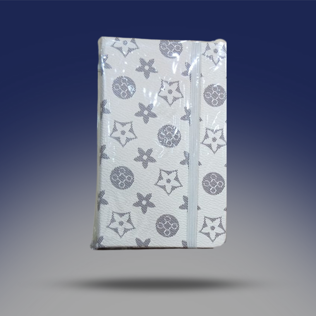 صوره المنتج نوت بوك صغيرة الحجم باللون الابيض مع الجراي باستيك لغلق النوتة